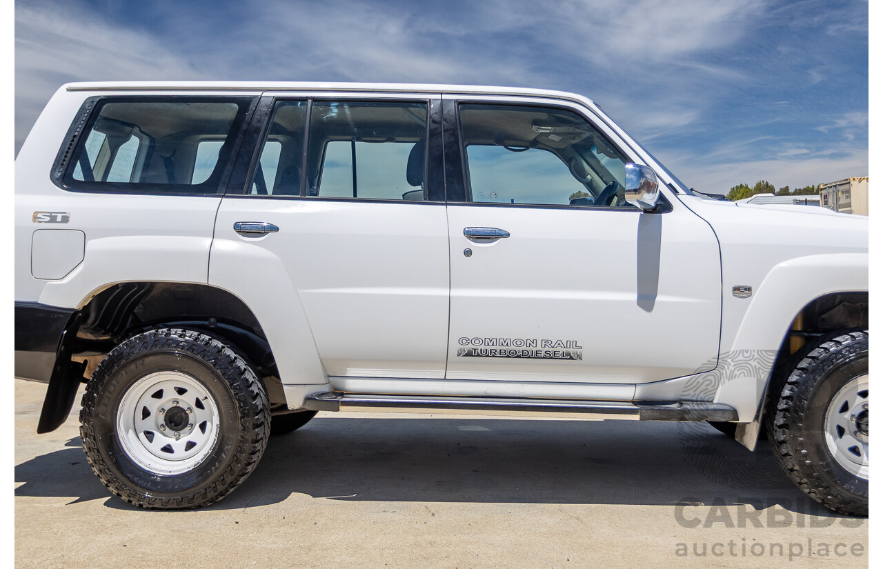 3/2010 Nissan Patrol ST (4x4) GU VI 4d Wagon Polar White Turbo Diesel 3.0L - 7 Seats
