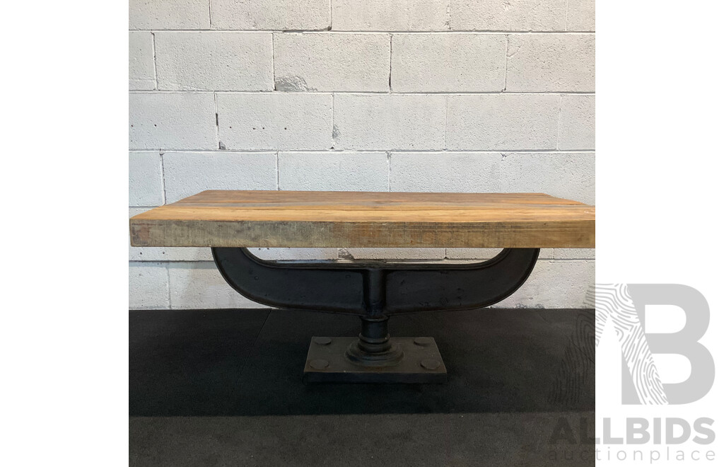 Industrial Style Coffee Table Features a Rustic Reclaimed Wood Top Suppoted by Heavy Cast Iron Pedestal Base