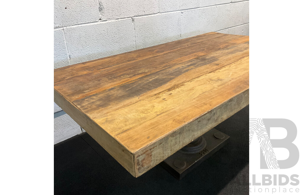 Industrial Style Coffee Table Features a Rustic Reclaimed Wood Top Suppoted by Heavy Cast Iron Pedestal Base