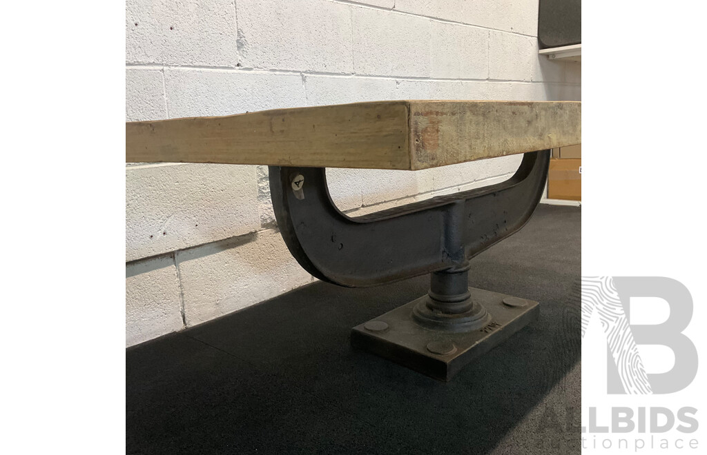 Industrial Style Coffee Table Features a Rustic Reclaimed Wood Top Suppoted by Heavy Cast Iron Pedestal Base