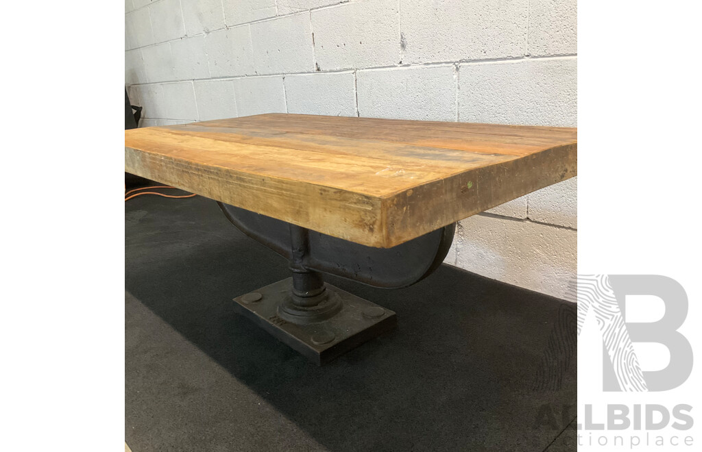 Industrial Style Coffee Table Features a Rustic Reclaimed Wood Top Suppoted by Heavy Cast Iron Pedestal Base