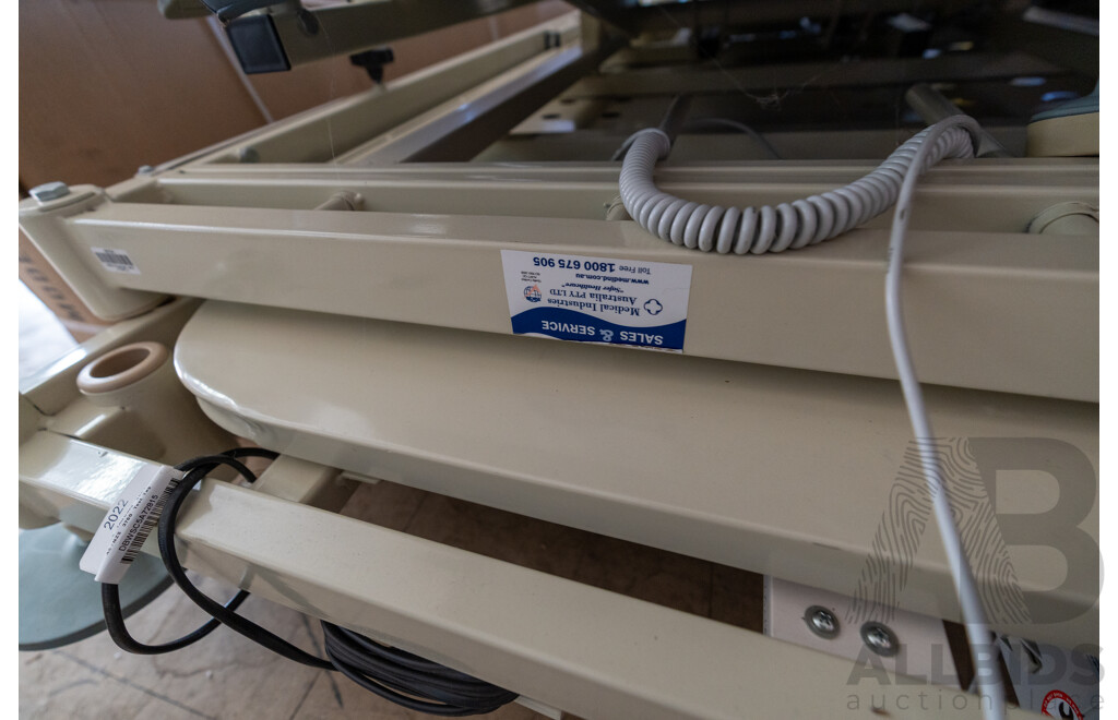 2008 Universal K2 Hospital Bed - Pair of with Attatchments