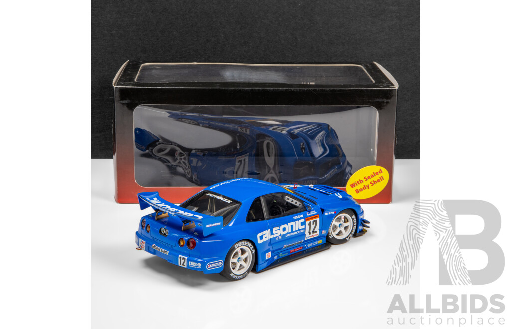 AUTOart Motorsport 2003 Nissan Skyline R34 GT-R JGTC GT500 Round 8 Suzuka Winner #12 Calsonic Livery - 1:18 Scale Model Car