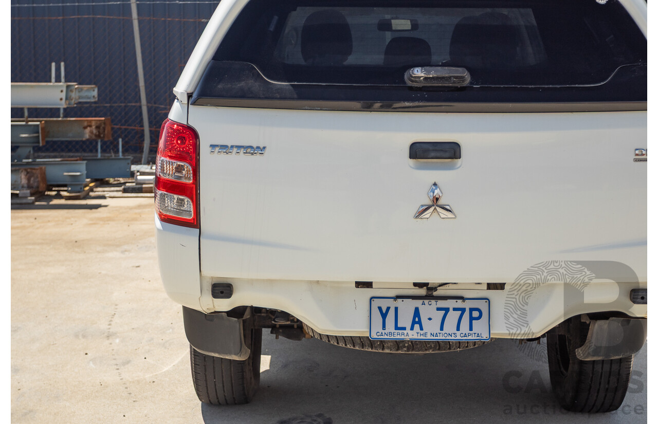 10/2016 Mitsubishi Triton GLX (4x4) MQ MY16 Dual Cab Utility Solid White Turbo Diesel 2.4L