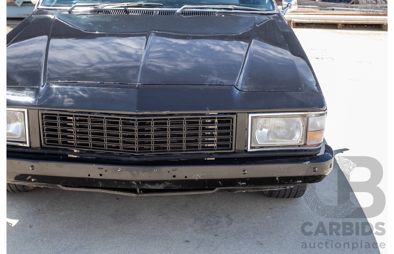 6/1981 Holden WB One Tonner 2d Trayback Utility Black V8 4.2L
