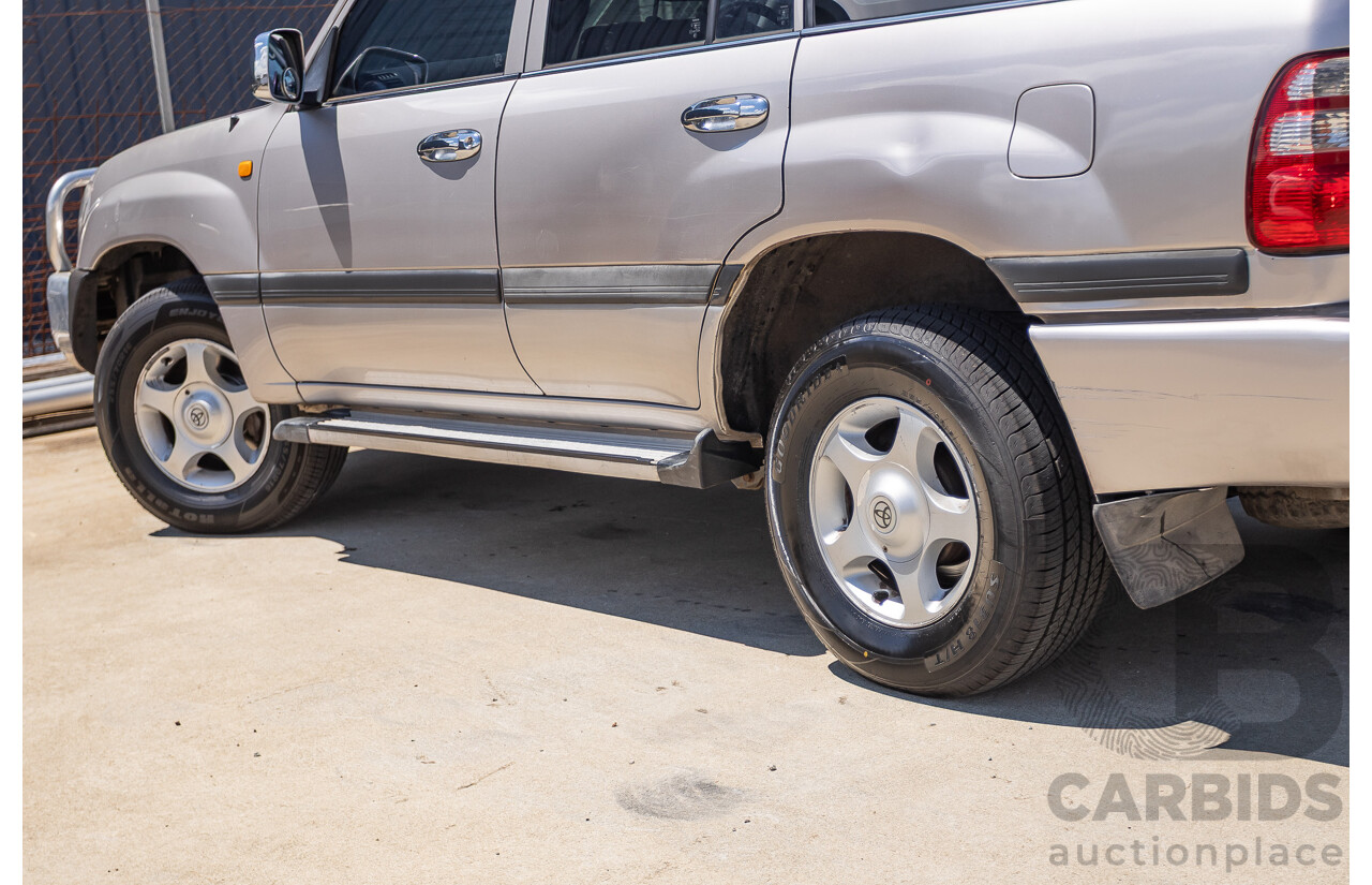 10/2002 Toyota Landcruiser GXL (4x4) FZJ105R 4D Warm Silver Metallic V8 4.7L - 8 Seater