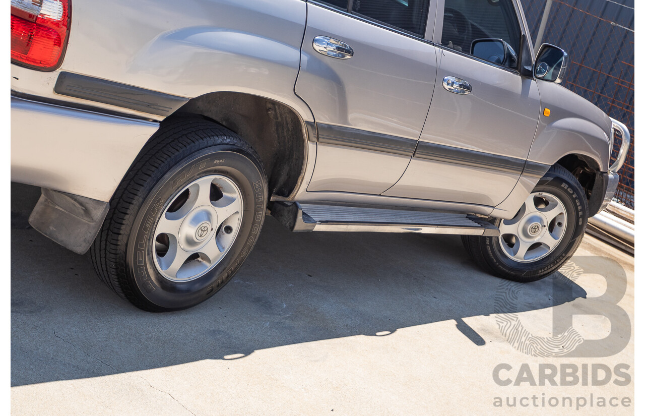 10/2002 Toyota Landcruiser GXL (4x4) FZJ105R 4D Warm Silver Metallic V8 4.7L - 8 Seater