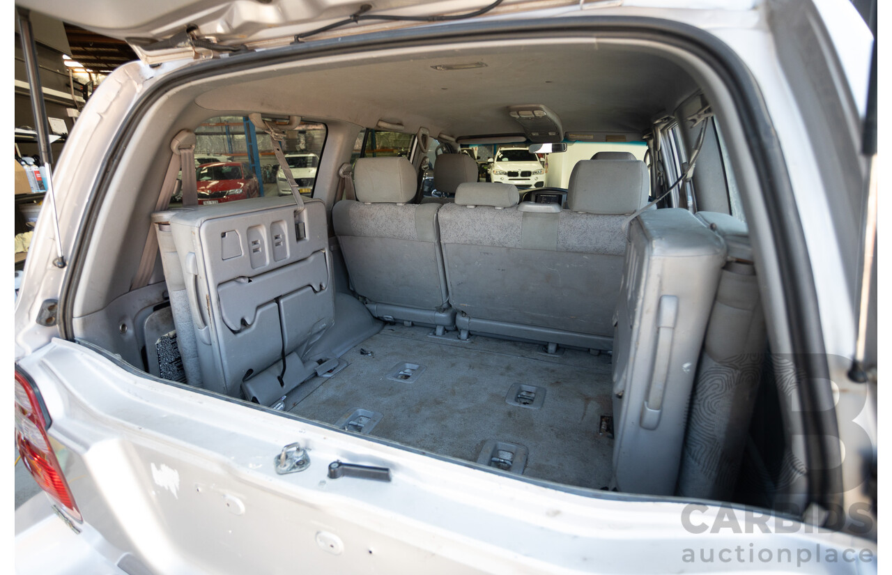 10/2002 Toyota Landcruiser GXL (4x4) FZJ105R 4D Warm Silver Metallic V8 4.7L - 8 Seater