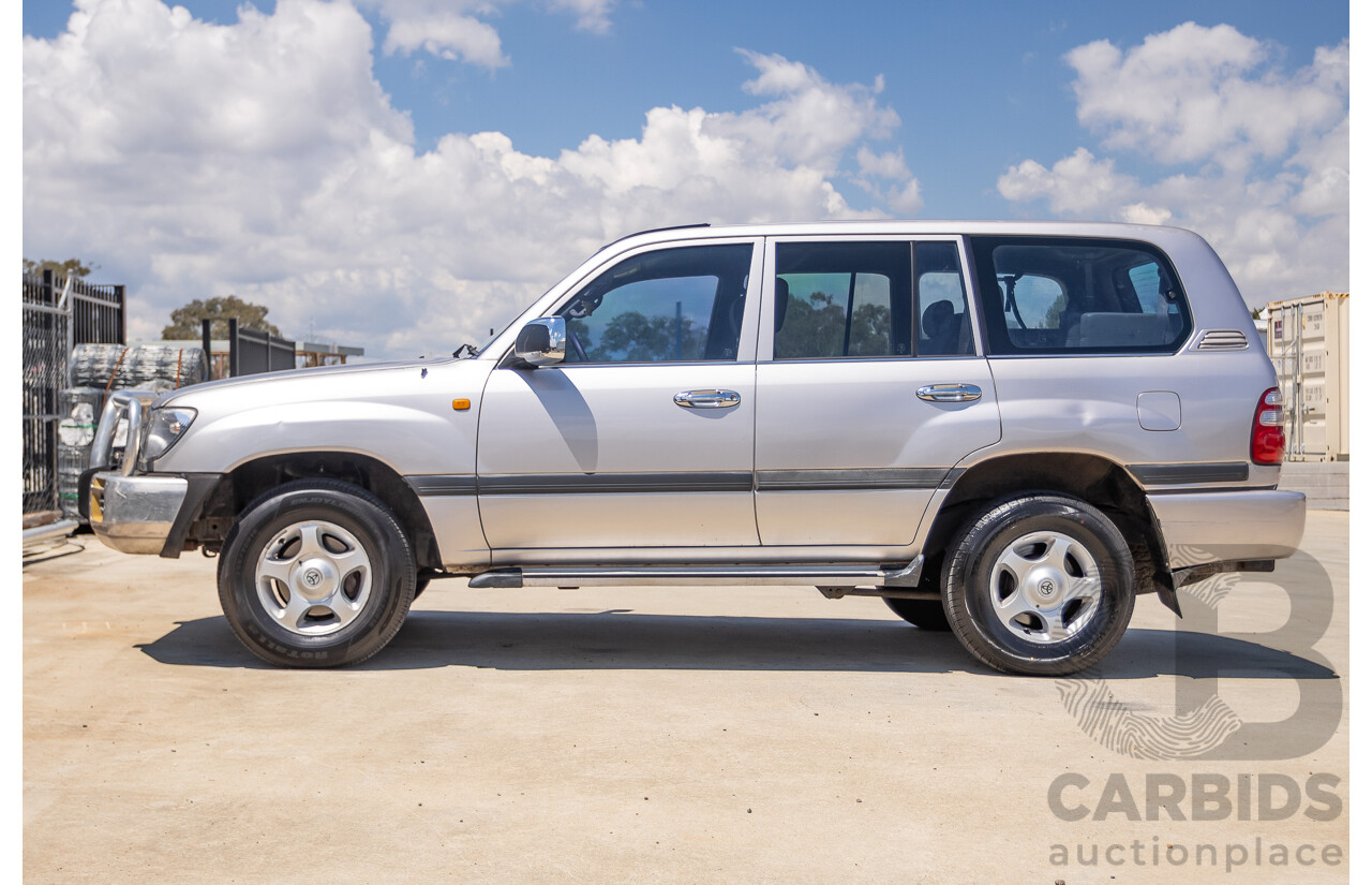10/2002 Toyota Landcruiser GXL (4x4) FZJ105R 4D Warm Silver Metallic V8 4.7L - 8 Seater