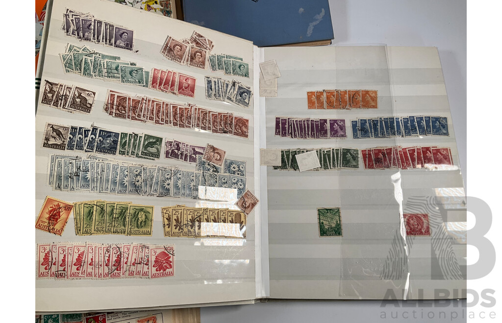 Four Albums of Vintage International Stamps Including ETA Postage Stamps of the World, Australian Predecimal, Ceylon Pakistan, France, Canada, New Zealand, Madagascar, South Africa, Uganda, Germany and More