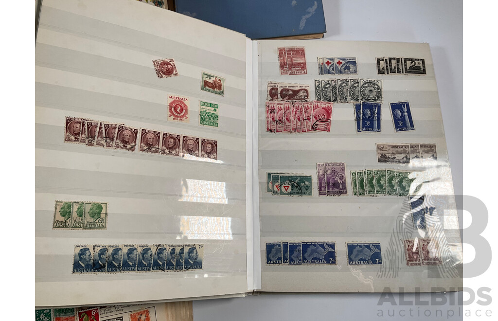 Four Albums of Vintage International Stamps Including ETA Postage Stamps of the World, Australian Predecimal, Ceylon Pakistan, France, Canada, New Zealand, Madagascar, South Africa, Uganda, Germany and More