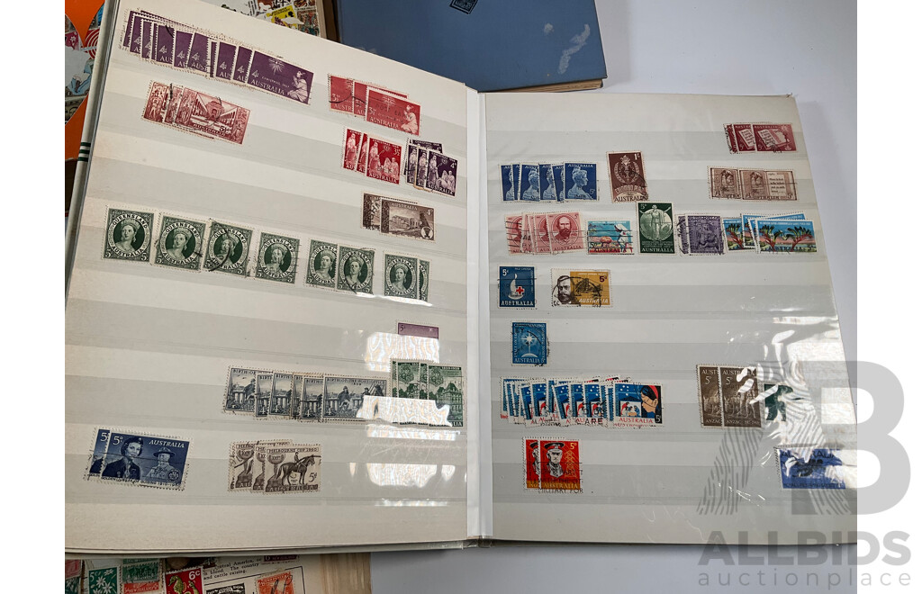 Four Albums of Vintage International Stamps Including ETA Postage Stamps of the World, Australian Predecimal, Ceylon Pakistan, France, Canada, New Zealand, Madagascar, South Africa, Uganda, Germany and More