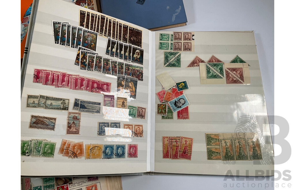 Four Albums of Vintage International Stamps Including ETA Postage Stamps of the World, Australian Predecimal, Ceylon Pakistan, France, Canada, New Zealand, Madagascar, South Africa, Uganda, Germany and More