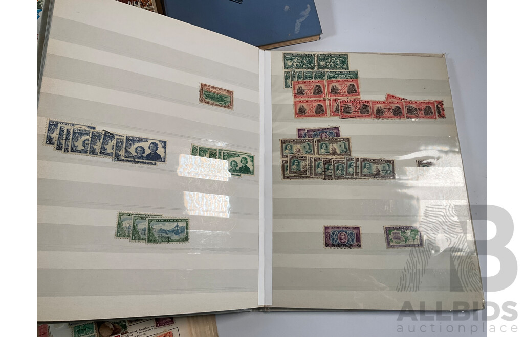 Four Albums of Vintage International Stamps Including ETA Postage Stamps of the World, Australian Predecimal, Ceylon Pakistan, France, Canada, New Zealand, Madagascar, South Africa, Uganda, Germany and More
