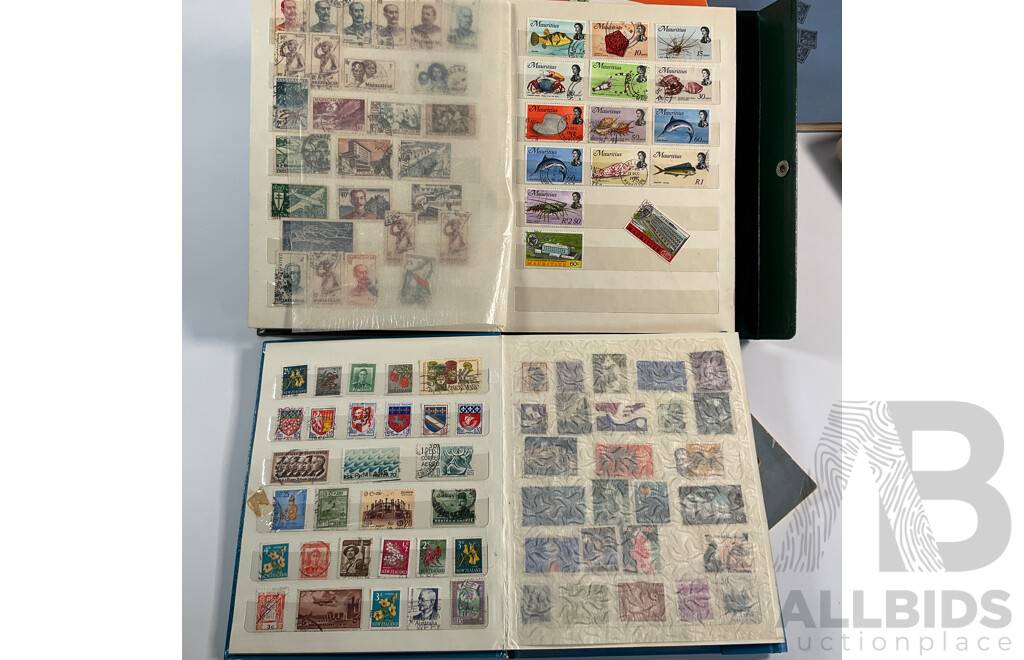 Four Albums of Vintage International Stamps Including ETA Postage Stamps of the World, Australian Predecimal, Ceylon Pakistan, France, Canada, New Zealand, Madagascar, South Africa, Uganda, Germany and More