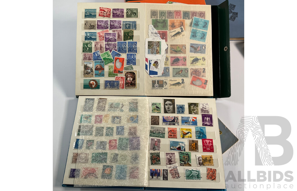 Four Albums of Vintage International Stamps Including ETA Postage Stamps of the World, Australian Predecimal, Ceylon Pakistan, France, Canada, New Zealand, Madagascar, South Africa, Uganda, Germany and More