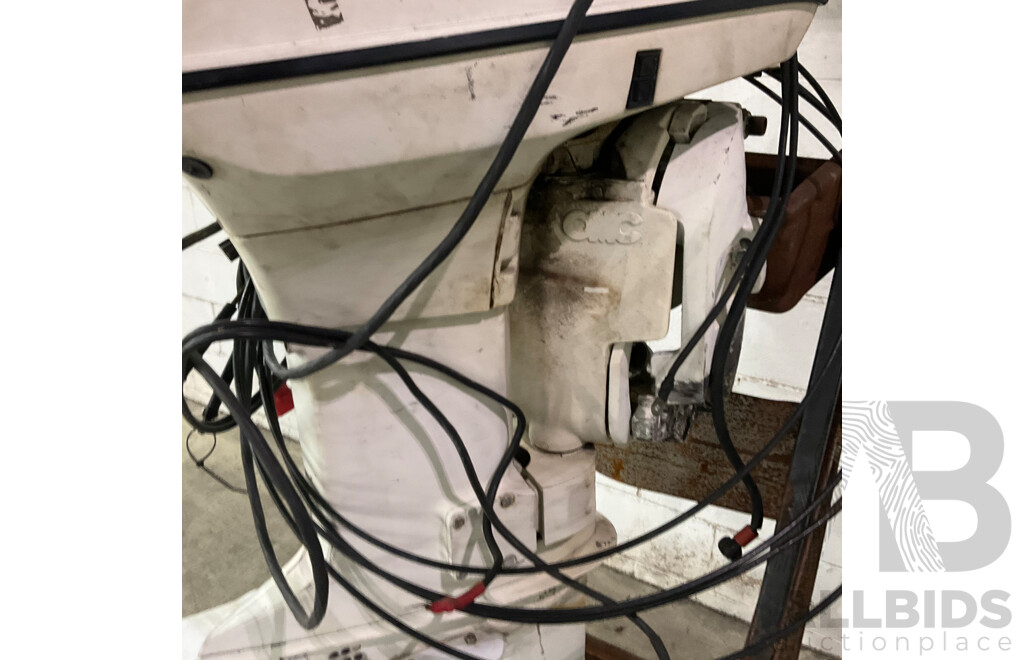 Johnson 70 Outboard Motor with Wheeled Stand