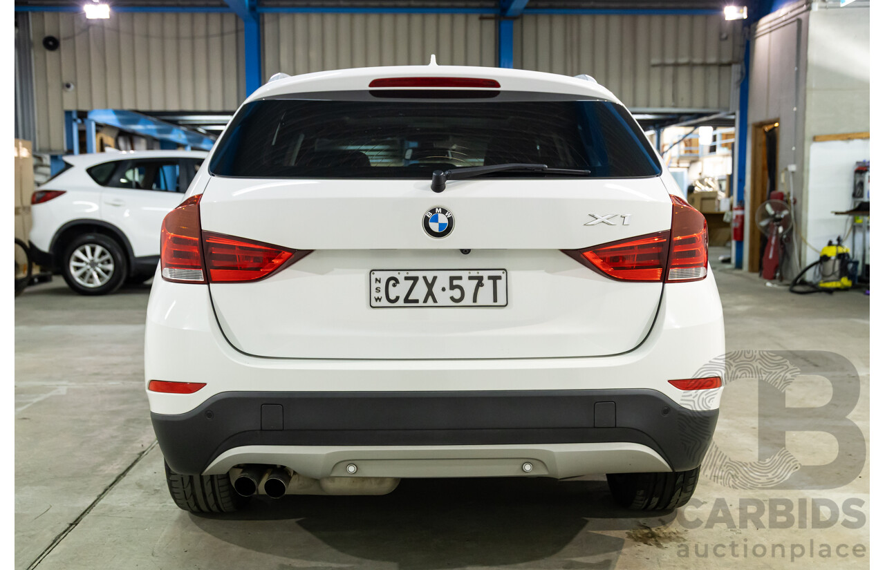 04/2015 BMW X1 sDrive20i (RWD) E84 MY15 4d Wagon Alpine White Turbo 2.0L