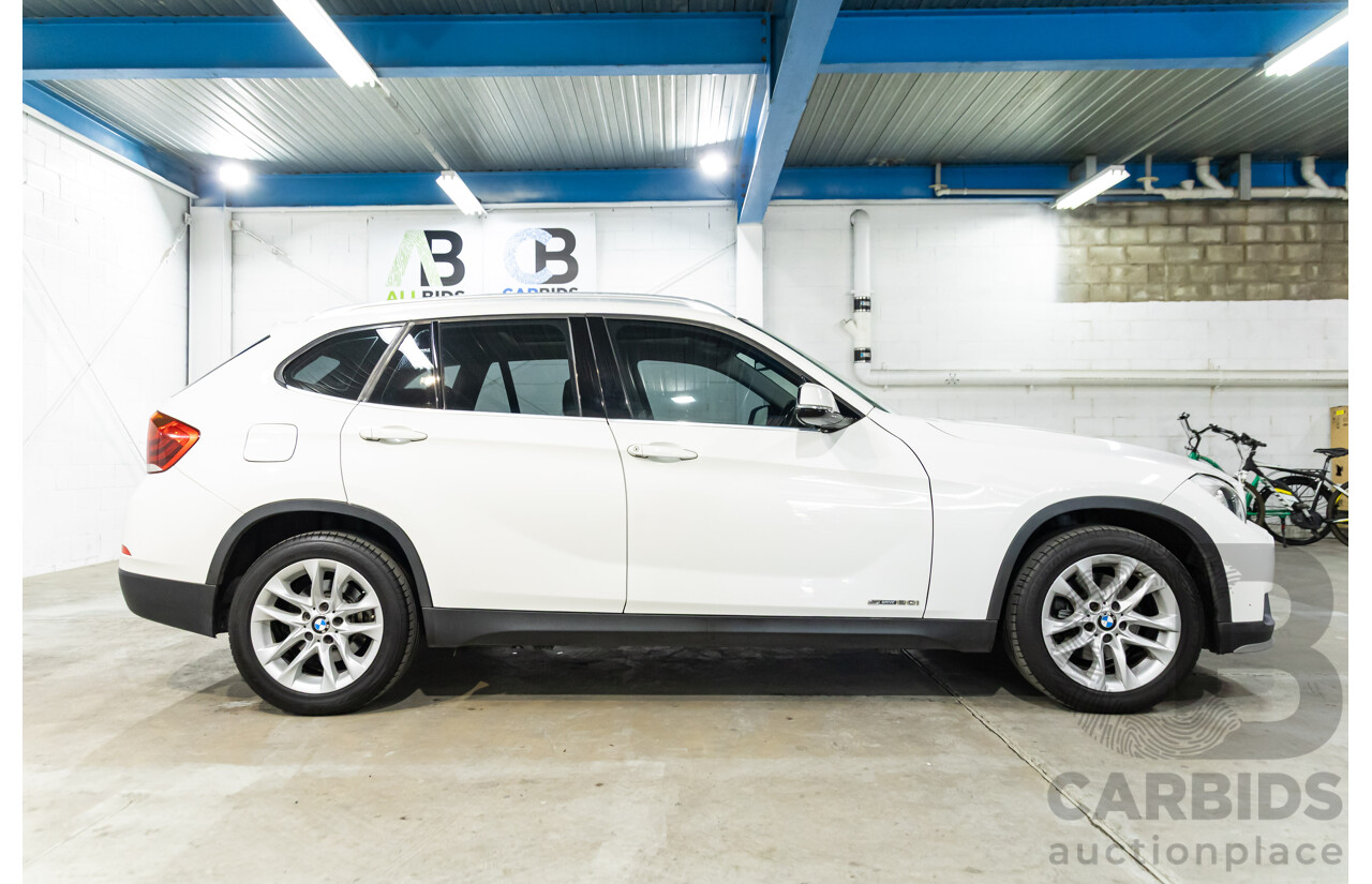 04/2015 BMW X1 sDrive20i (RWD) E84 MY15 4d Wagon Alpine White Turbo 2.0L