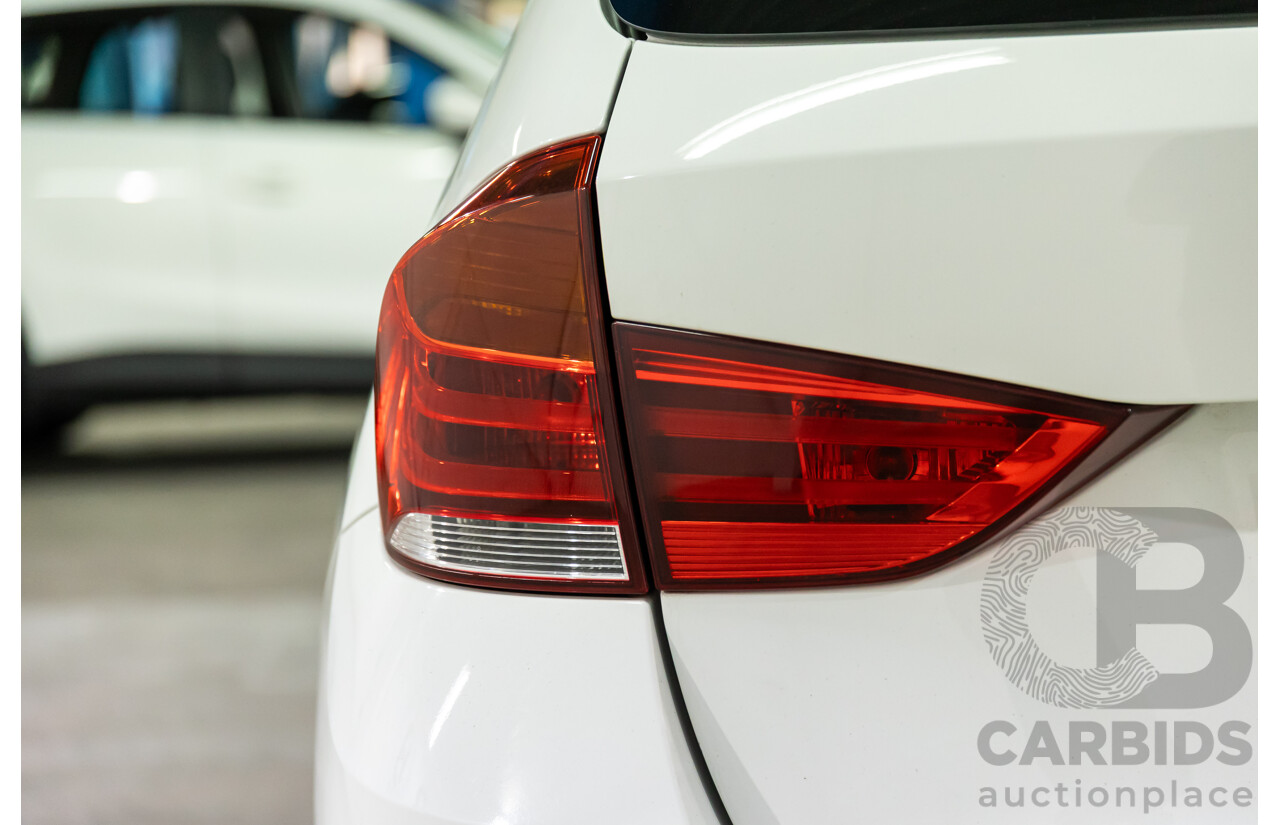 04/2015 BMW X1 sDrive20i (RWD) E84 MY15 4d Wagon Alpine White Turbo 2.0L