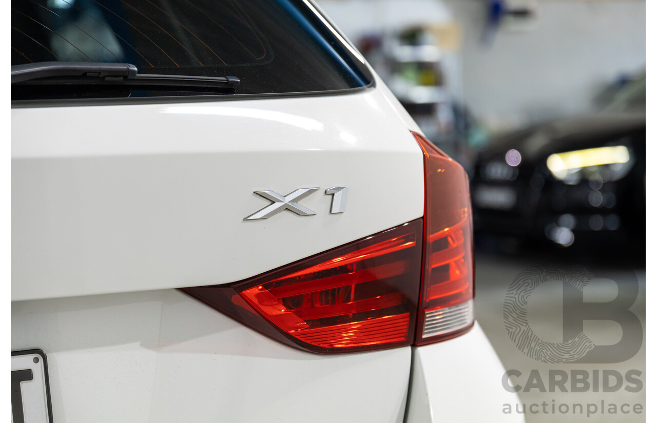 04/2015 BMW X1 sDrive20i (RWD) E84 MY15 4d Wagon Alpine White Turbo 2.0L