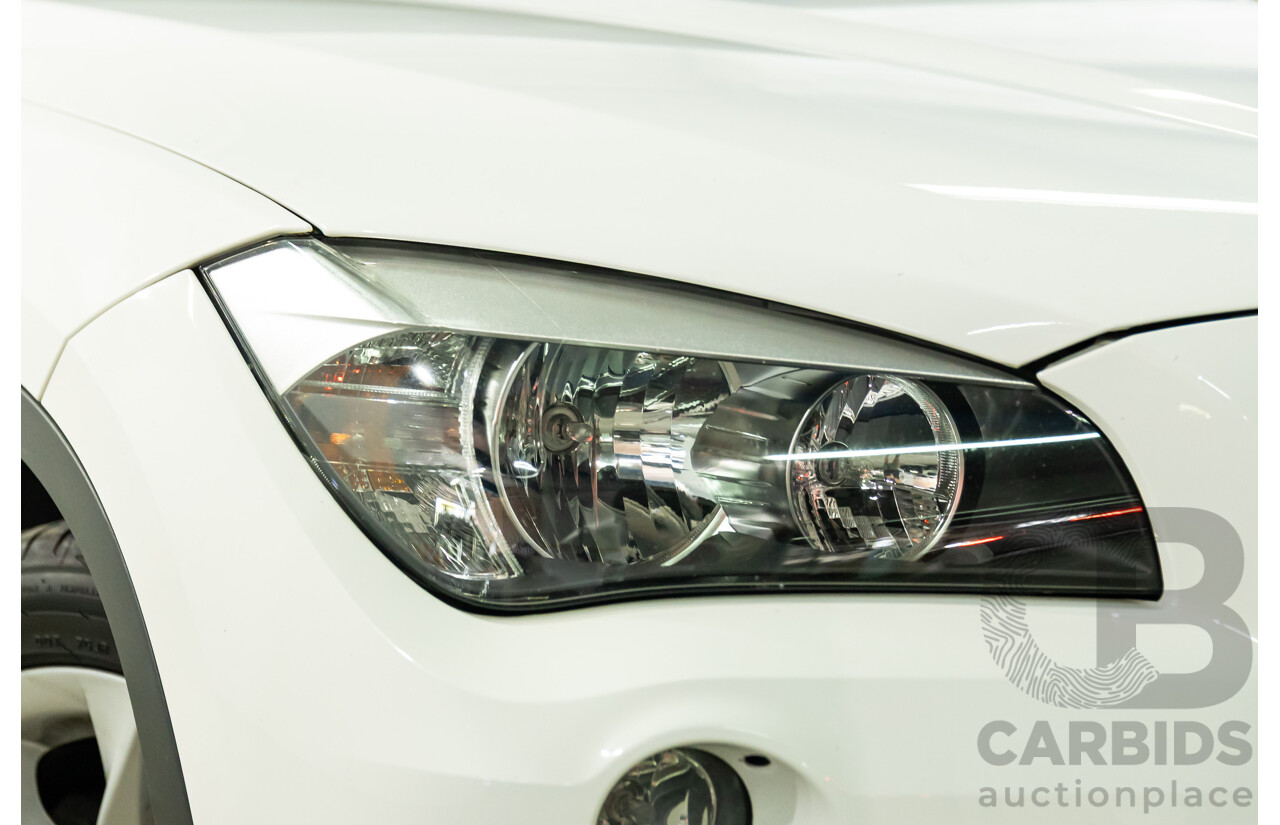04/2015 BMW X1 sDrive20i (RWD) E84 MY15 4d Wagon Alpine White Turbo 2.0L
