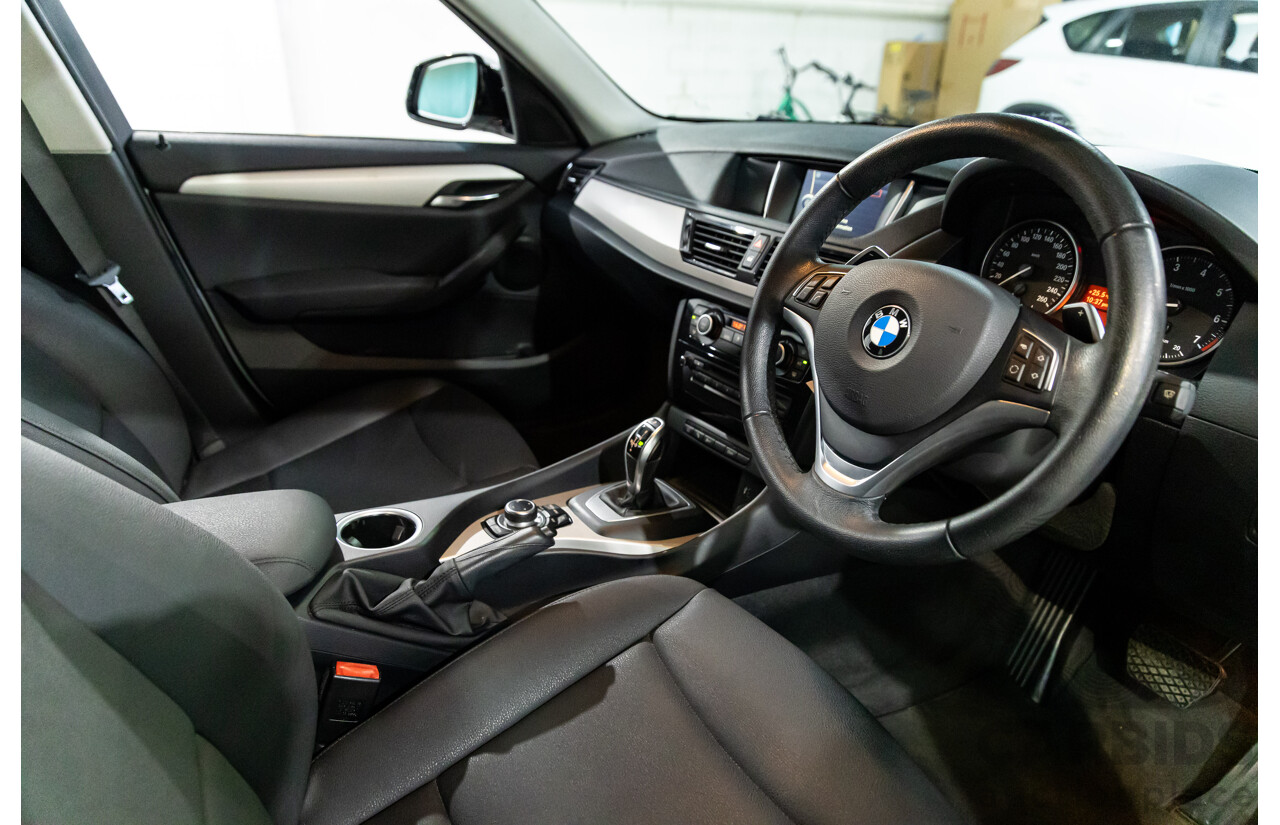 04/2015 BMW X1 sDrive20i (RWD) E84 MY15 4d Wagon Alpine White Turbo 2.0L