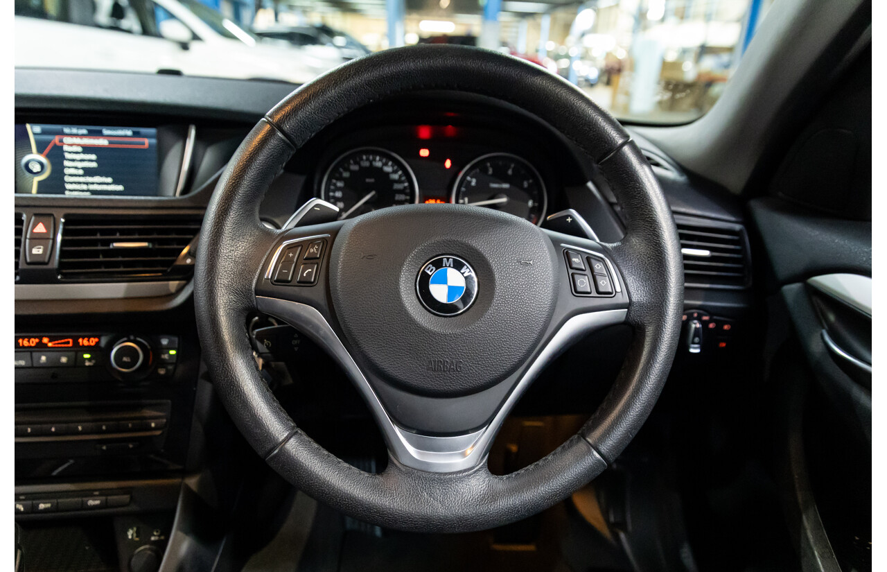 04/2015 BMW X1 sDrive20i (RWD) E84 MY15 4d Wagon Alpine White Turbo 2.0L