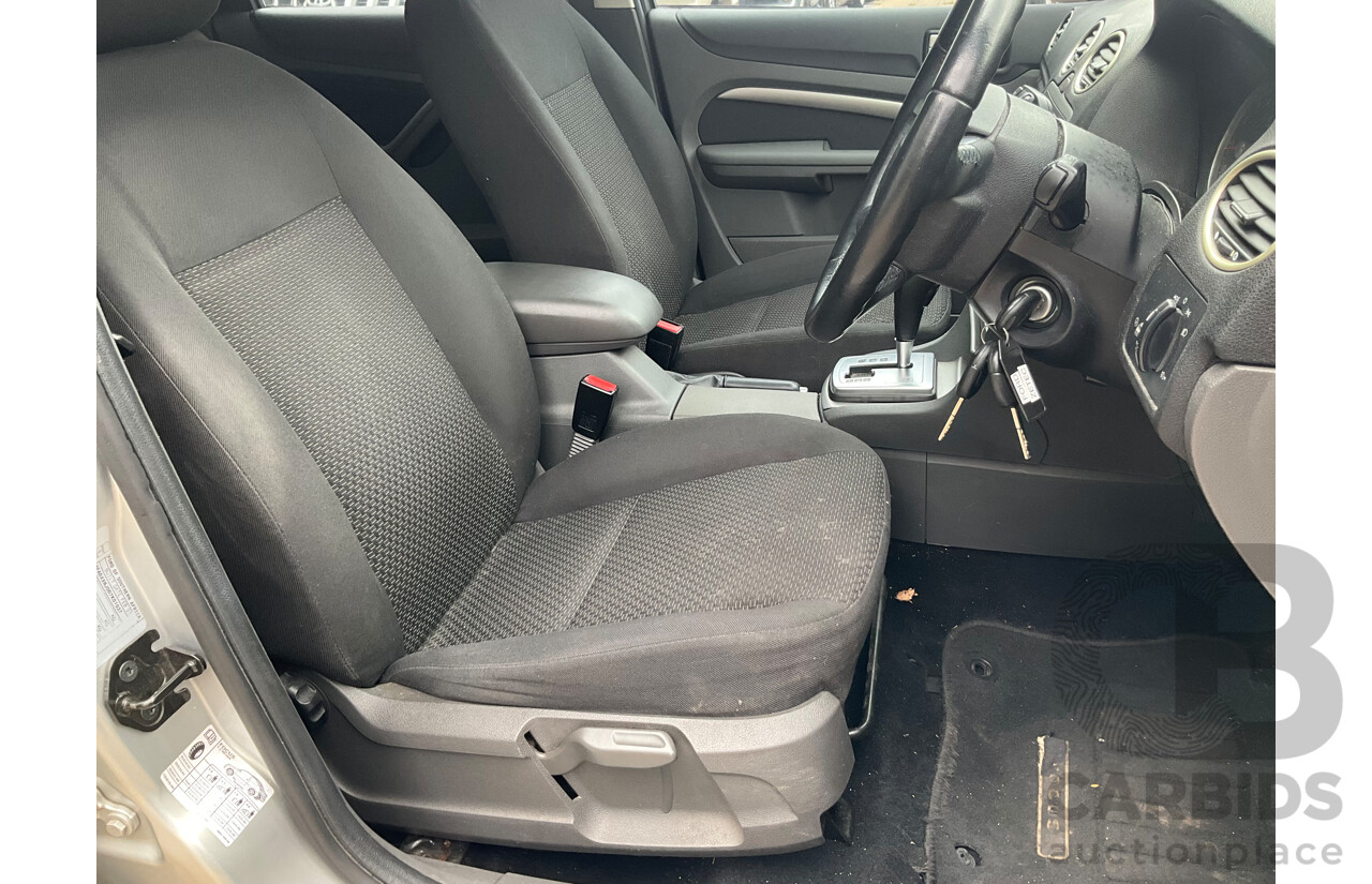 3/2007 Ford Focus Zetec LS 5d Hatchback Pure Silver Metallic  2.0L