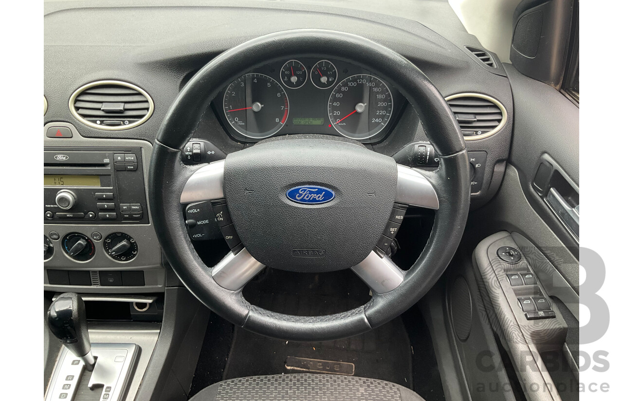3/2007 Ford Focus Zetec LS 5d Hatchback Pure Silver Metallic  2.0L