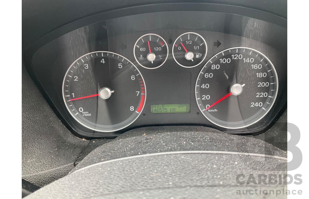 3/2007 Ford Focus Zetec LS 5d Hatchback Pure Silver Metallic  2.0L