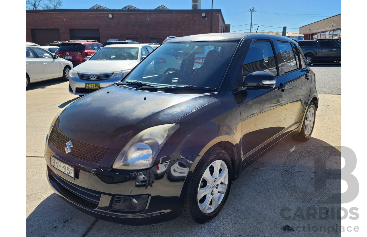 2/2010 Suzuki Swift RE.4 EZ MY07 UPDATE 5d Hatchback Black 1.5L