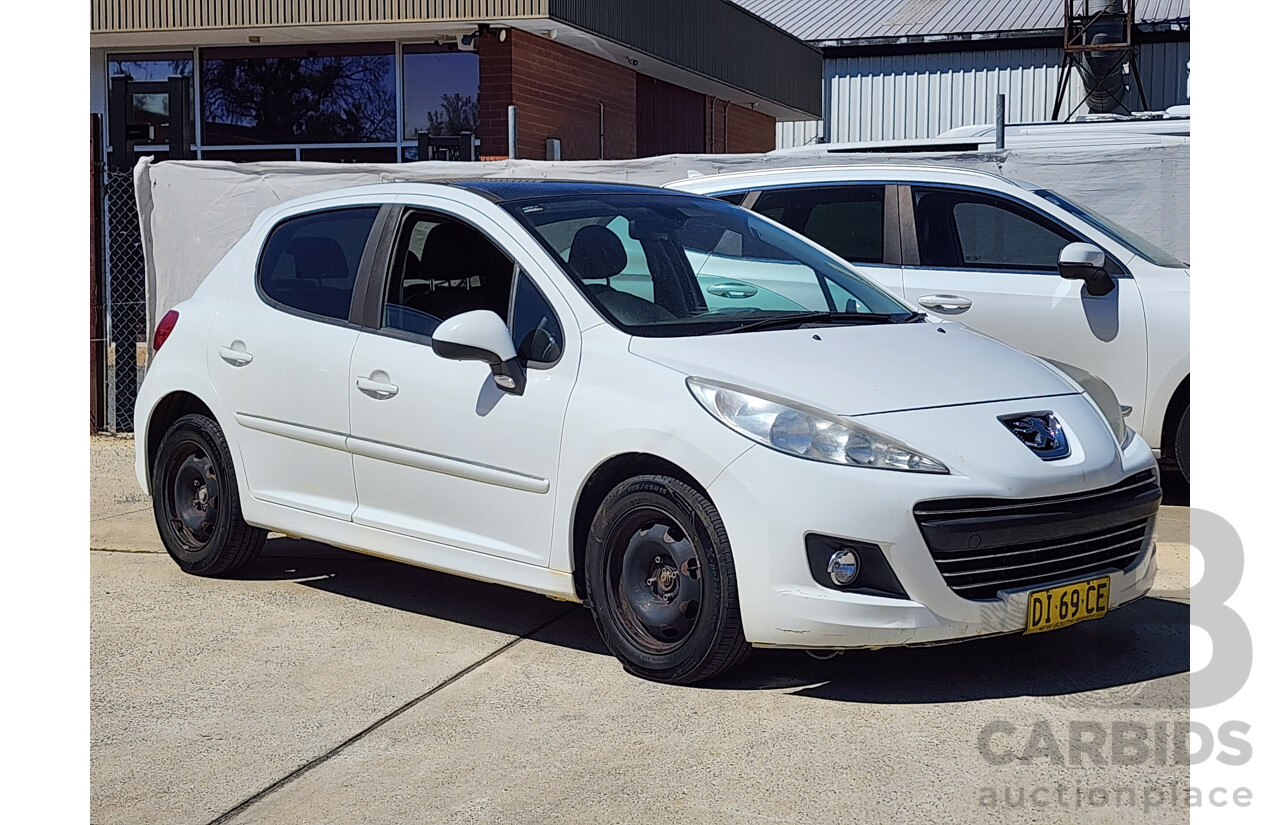 6/2010 Peugeot 207 XT HDi MY10 5d Hatchback White 1.6L