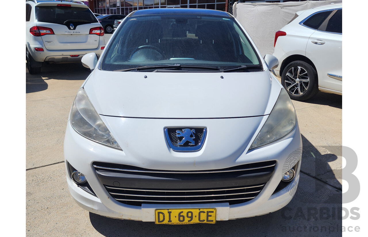 6/2010 Peugeot 207 XT HDi MY10 5d Hatchback White 1.6L