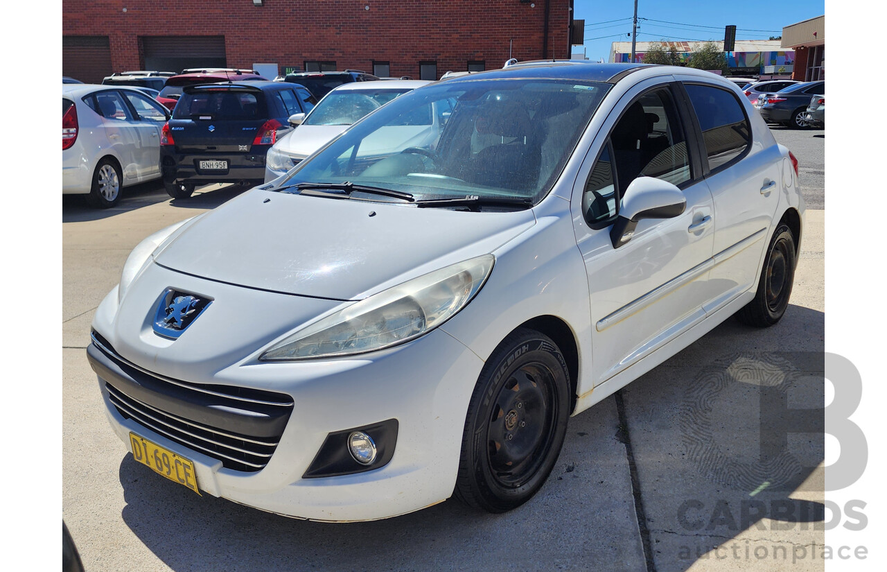 6/2010 Peugeot 207 XT HDi MY10 5d Hatchback White 1.6L