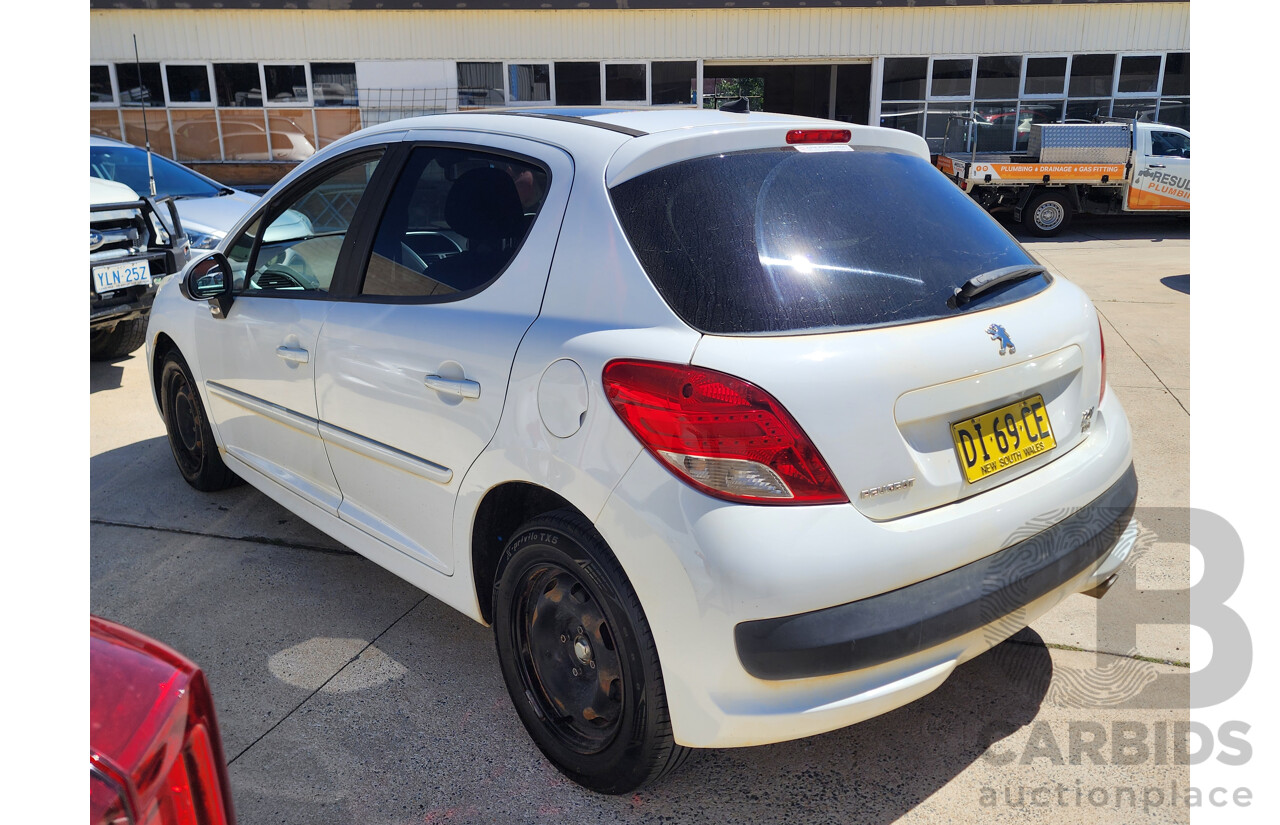6/2010 Peugeot 207 XT HDi MY10 5d Hatchback White 1.6L