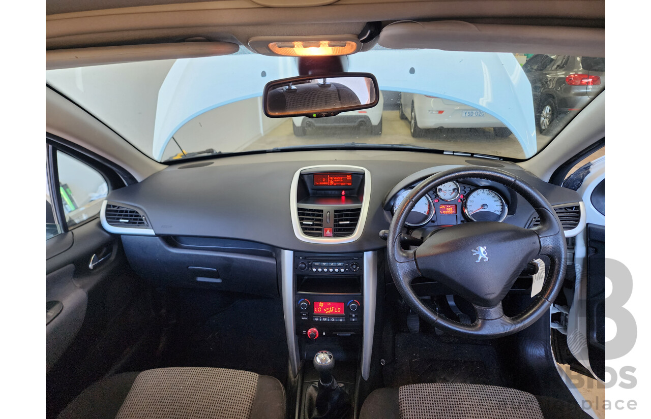 6/2010 Peugeot 207 XT HDi MY10 5d Hatchback White 1.6L