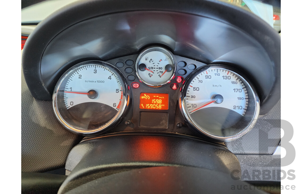 6/2010 Peugeot 207 XT HDi MY10 5d Hatchback White 1.6L