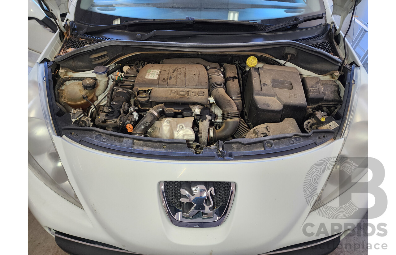 6/2010 Peugeot 207 XT HDi MY10 5d Hatchback White 1.6L