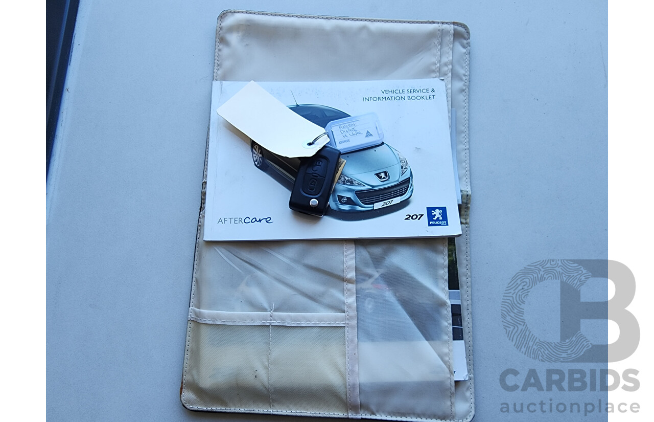 6/2010 Peugeot 207 XT HDi MY10 5d Hatchback White 1.6L