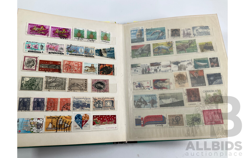Four Albums of International Vintage Stamps Including Spain, Canada, Mauritius, Philippines, Monaco, Hong Kong, Netherlands, Zambia, Tonga and More