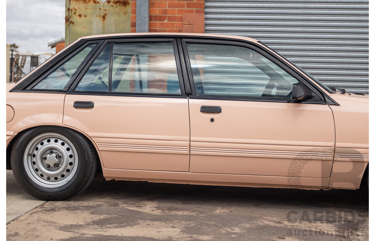 6/1988 Holden VL Commodore Executive 4d Sedan Pastel Pink Turbo 3.0L