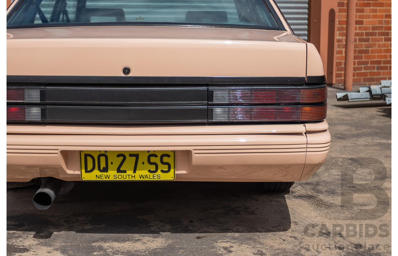 6/1988 Holden VL Commodore Executive 4d Sedan Pastel Pink Turbo 3.0L