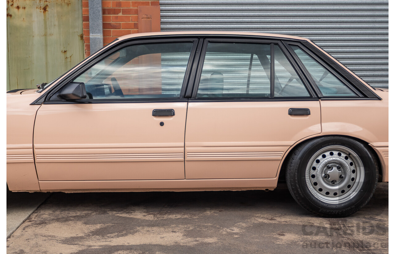 6/1988 Holden VL Commodore Executive 4d Sedan Pastel Pink Turbo 3.0L