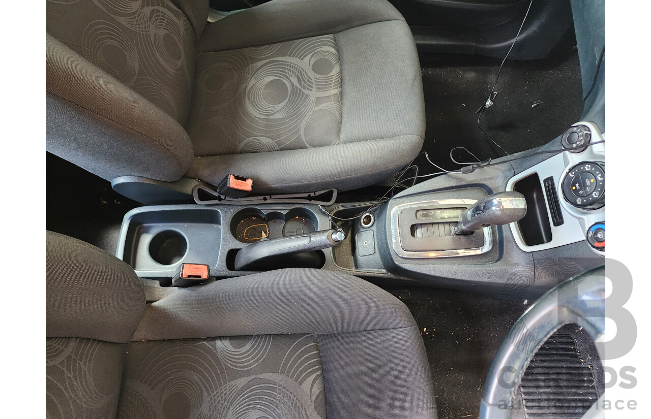 10/2010 Ford Fiesta LX WT 4d Sedan Orange 1.6L