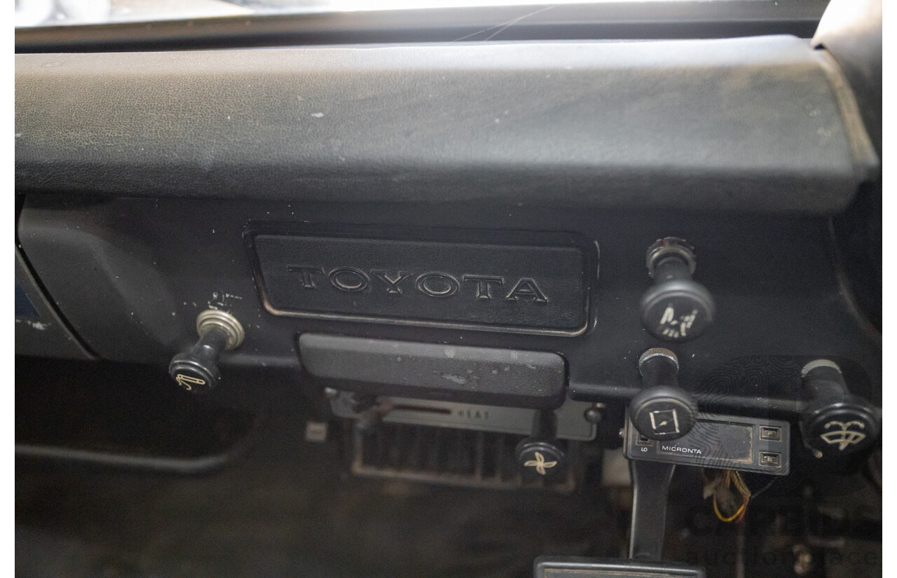 3/1977 Toyota Dyna 4d Tray Back Solid White 2.0L