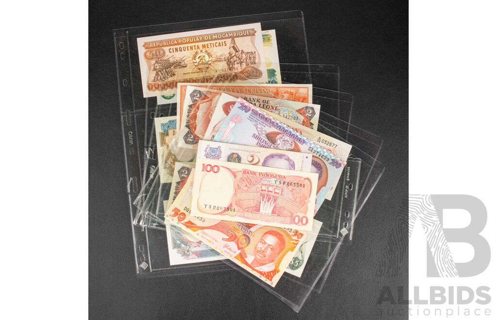 Collection of International Banknotes Including Tanzania, Zambia, Guyana, Sierra Leone, Suriname, Indonesia, Singapore