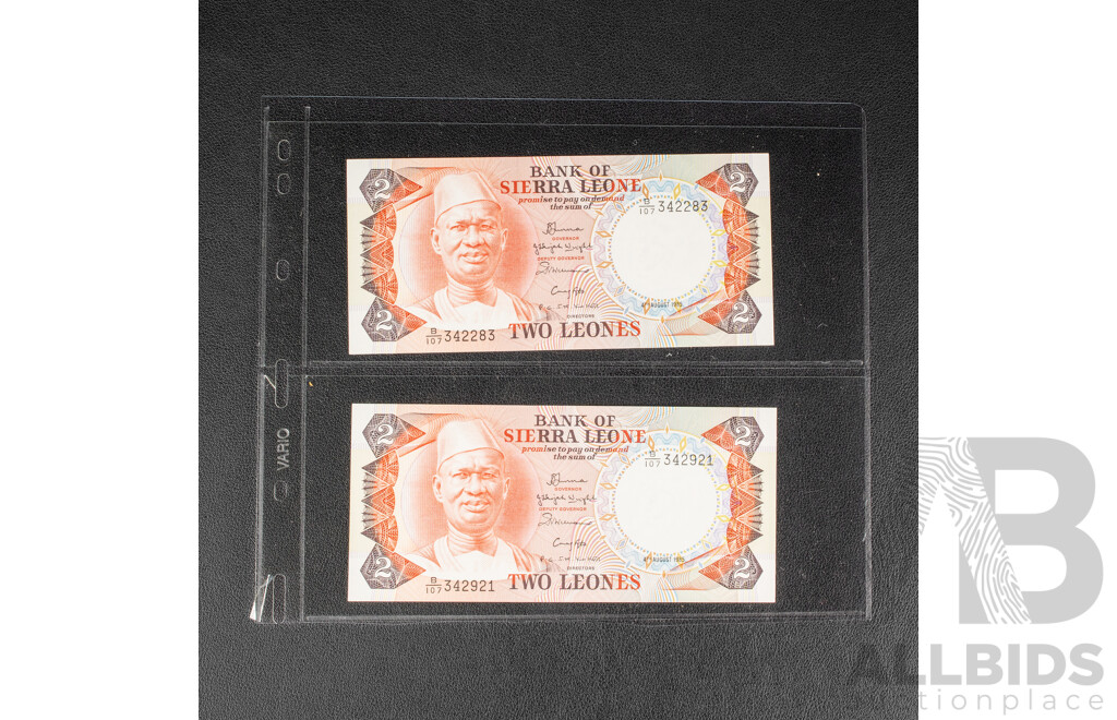 Collection of International Banknotes Including Tanzania, Zambia, Guyana, Sierra Leone, Suriname, Indonesia, Singapore