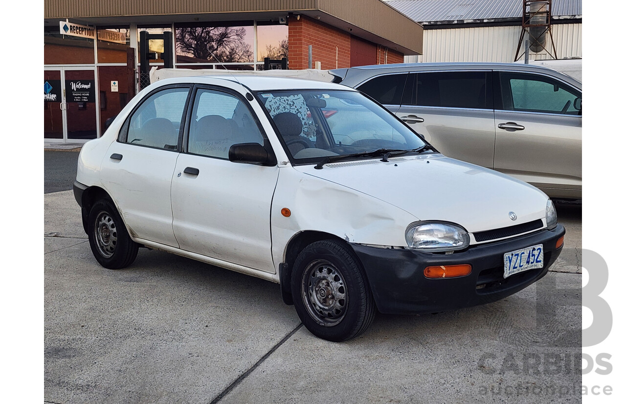 5/1995 Mazda 121 4d Sedan White - Lot 1655953 | CARBIDS