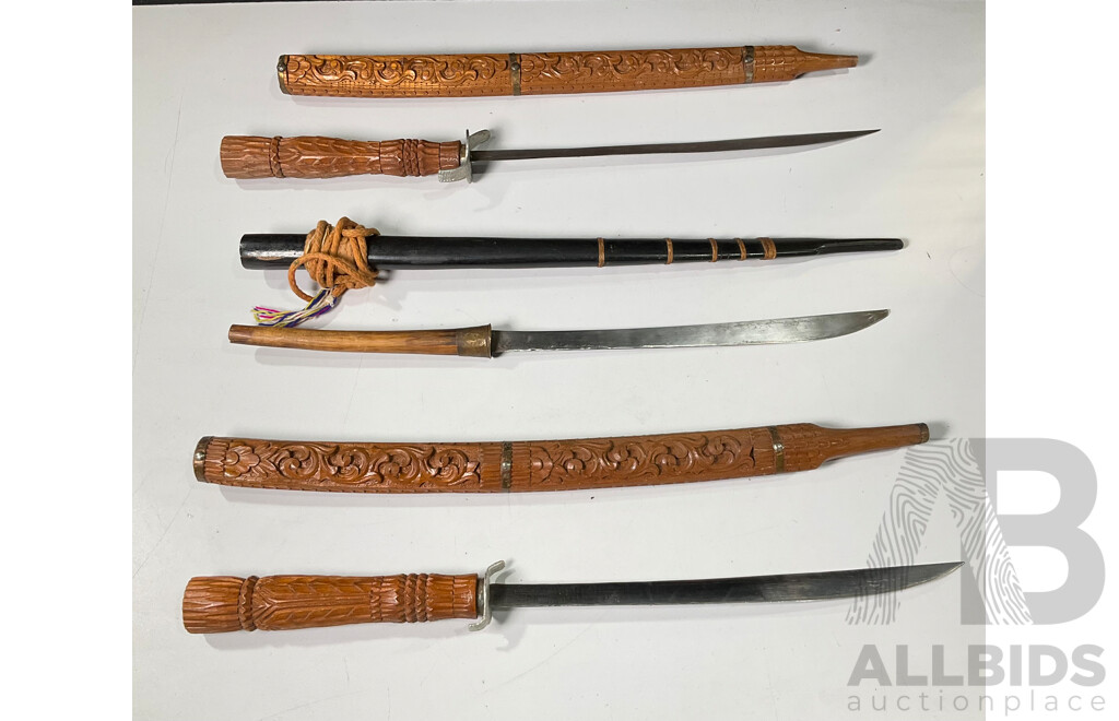 Three Vintage South East Asian Swords with Timber Scabbards